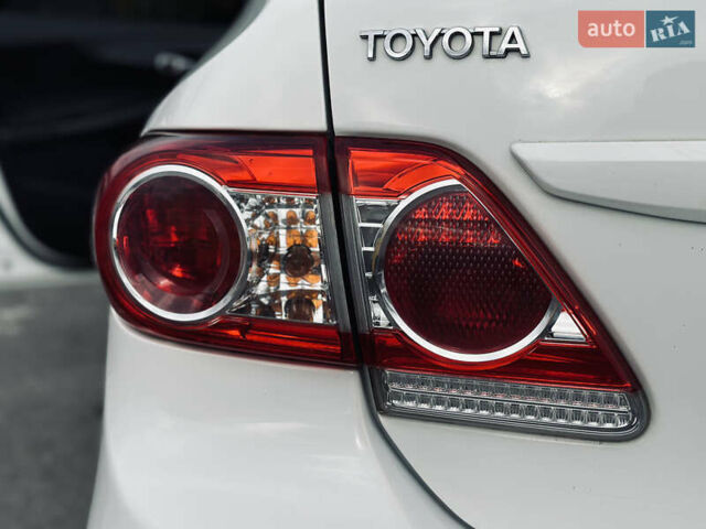 Білий Тойота Королла, об'ємом двигуна 1.33 л та пробігом 243 тис. км за 7399 $, фото 10 на Automoto.ua