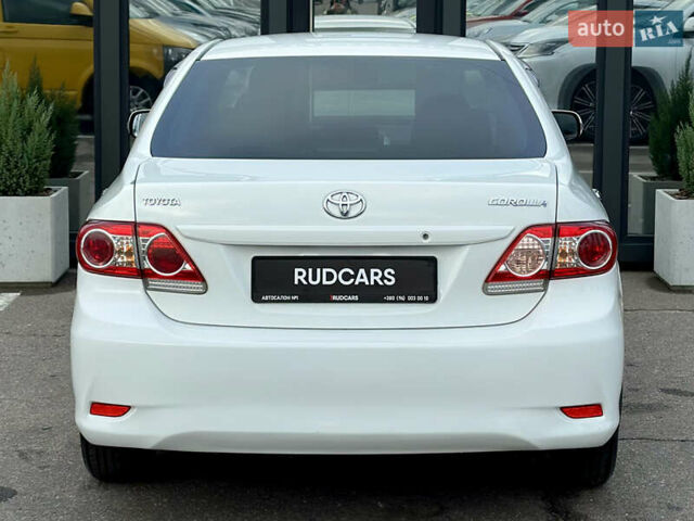 Білий Тойота Королла, об'ємом двигуна 1.33 л та пробігом 243 тис. км за 7399 $, фото 4 на Automoto.ua