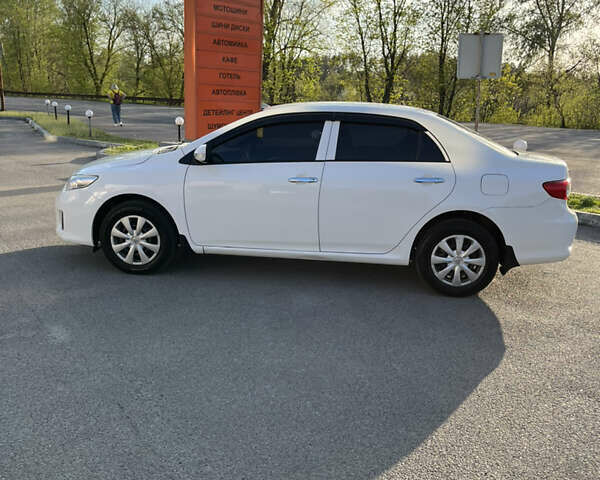 Белый Тойота Королла, объемом двигателя 1.3 л и пробегом 184 тыс. км за 7000 $, фото 5 на Automoto.ua