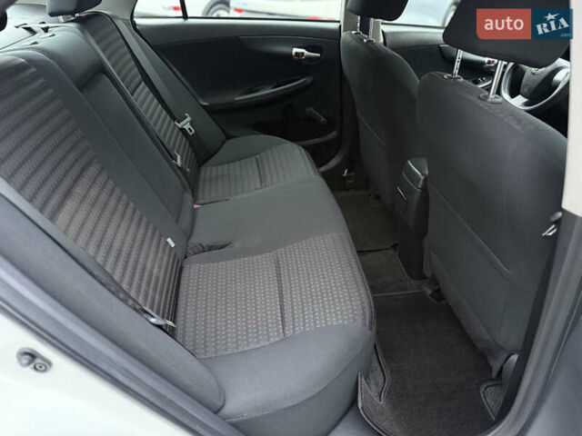 Белый Тойота Королла, объемом двигателя 1.3 л и пробегом 117 тыс. км за 8500 $, фото 29 на Automoto.ua