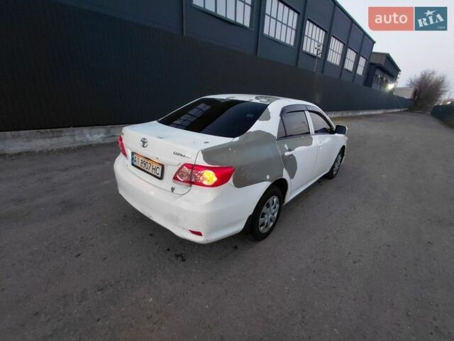 Білий Тойота Королла, об'ємом двигуна 1.33 л та пробігом 189 тис. км за 4950 $, фото 5 на Automoto.ua