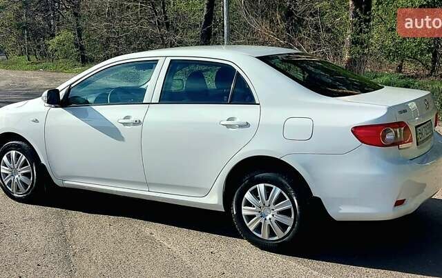 Белый Тойота Королла, объемом двигателя 1.33 л и пробегом 128 тыс. км за 6900 $, фото 8 на Automoto.ua