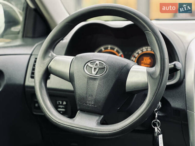 Білий Тойота Королла, об'ємом двигуна 1.33 л та пробігом 243 тис. км за 7399 $, фото 28 на Automoto.ua