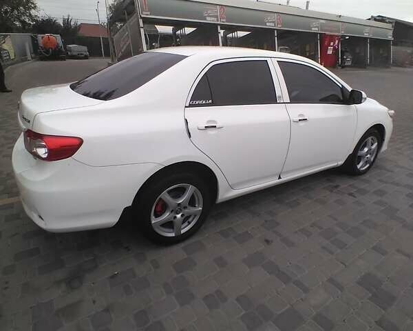 Білий Тойота Королла, об'ємом двигуна 1.6 л та пробігом 156 тис. км за 9300 $, фото 10 на Automoto.ua