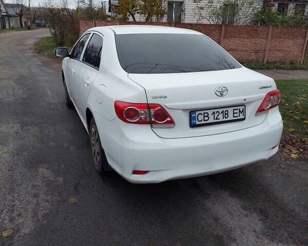 Білий Тойота Королла, об'ємом двигуна 1.33 л та пробігом 96 тис. км за 9800 $, фото 3 на Automoto.ua