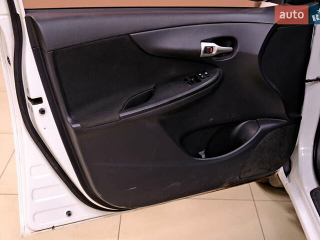 Белый Тойота Королла, объемом двигателя 1.6 л и пробегом 119 тыс. км за 7900 $, фото 24 на Automoto.ua