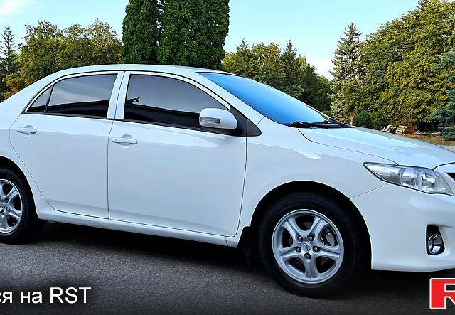 Белый Тойота Королла, объемом двигателя 1.6 л и пробегом 83 тыс. км за 9300 $, фото 2 на Automoto.ua