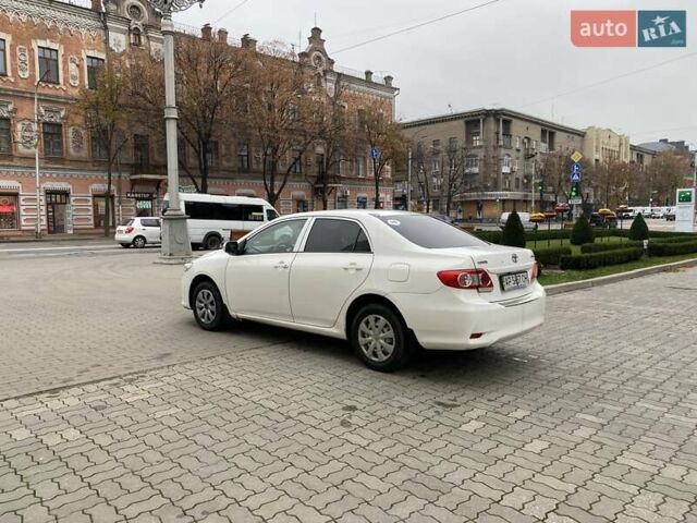 Белый Тойота Королла, объемом двигателя 1.33 л и пробегом 300 тыс. км за 5250 $, фото 8 на Automoto.ua