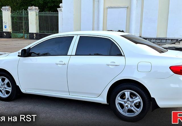 Белый Тойота Королла, объемом двигателя 1.6 л и пробегом 83 тыс. км за 9300 $, фото 1 на Automoto.ua