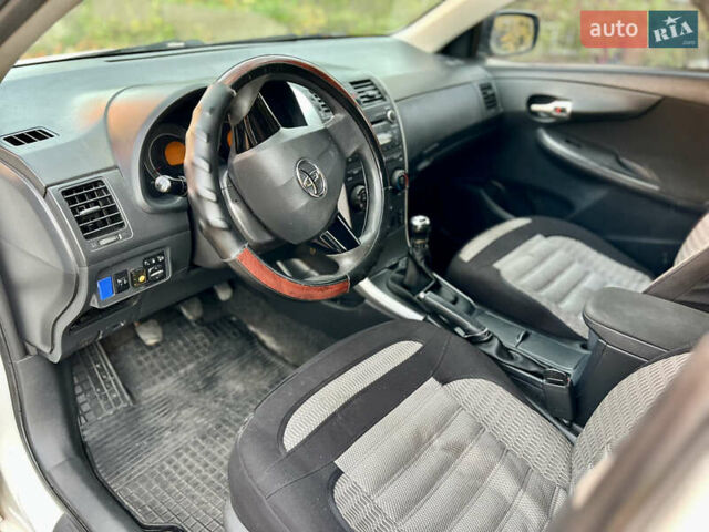 Білий Тойота Королла, об'ємом двигуна 1.33 л та пробігом 302 тис. км за 3999 $, фото 23 на Automoto.ua