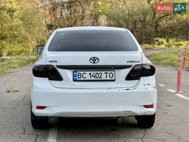 Білий Тойота Королла, об'ємом двигуна 1.33 л та пробігом 302 тис. км за 3999 $, фото 11 на Automoto.ua