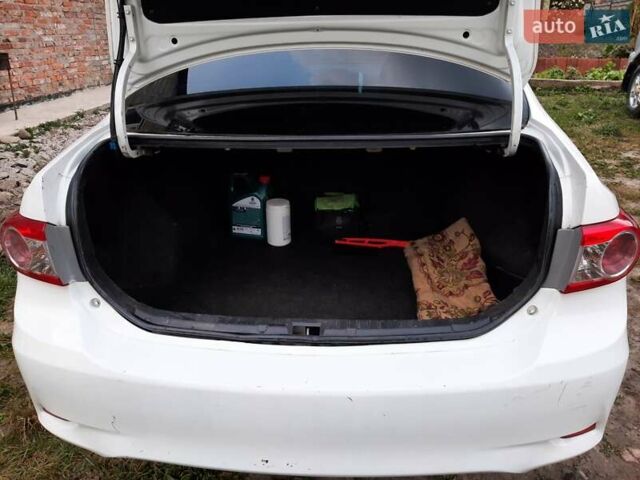 Белый Тойота Королла, объемом двигателя 1.3 л и пробегом 209 тыс. км за 6500 $, фото 18 на Automoto.ua