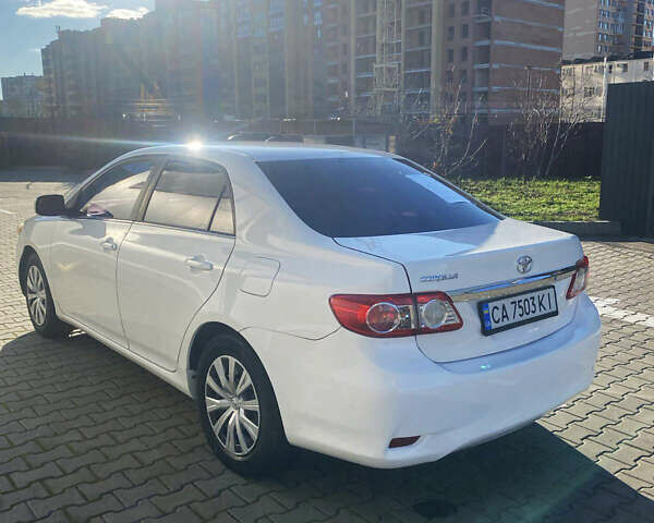 Белый Тойота Королла, объемом двигателя 1.8 л и пробегом 220 тыс. км за 7999 $, фото 4 на Automoto.ua