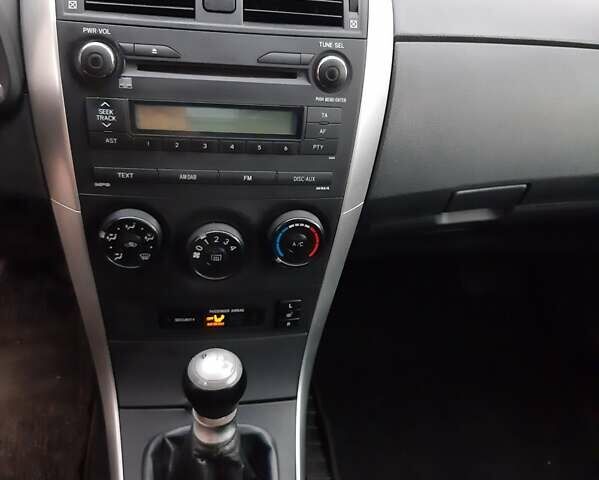 Белый Тойота Королла, объемом двигателя 1.3 л и пробегом 209 тыс. км за 6500 $, фото 9 на Automoto.ua