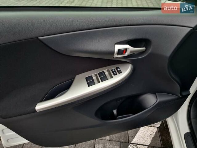 Білий Тойота Королла, об'ємом двигуна 1.6 л та пробігом 97 тис. км за 11300 $, фото 38 на Automoto.ua
