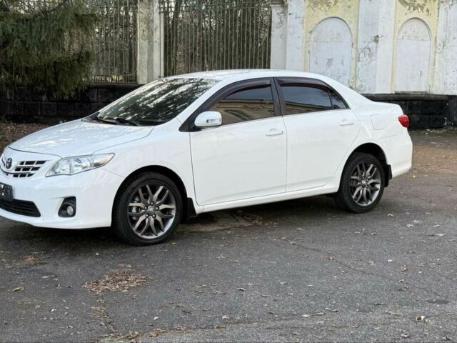 Белый Тойота Королла, объемом двигателя 1.6 л и пробегом 93 тыс. км за 10500 $, фото 2 на Automoto.ua