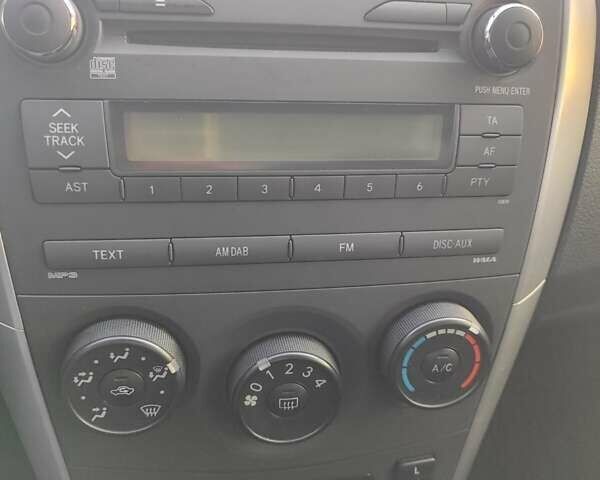 Белый Тойота Королла, объемом двигателя 1.33 л и пробегом 79 тыс. км за 7550 $, фото 21 на Automoto.ua