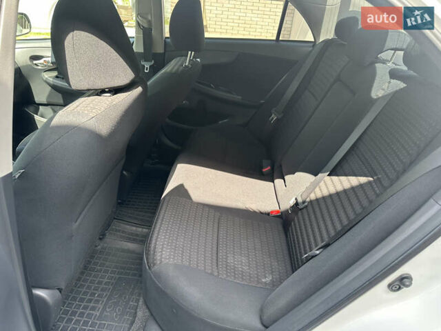 Білий Тойота Королла, об'ємом двигуна 1.3 л та пробігом 152 тис. км за 7300 $, фото 15 на Automoto.ua