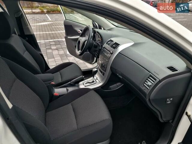 Білий Тойота Королла, об'ємом двигуна 1.6 л та пробігом 97 тис. км за 11300 $, фото 37 на Automoto.ua