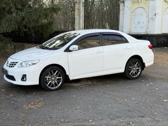 Белый Тойота Королла, объемом двигателя 1.6 л и пробегом 93 тыс. км за 10500 $, фото 3 на Automoto.ua