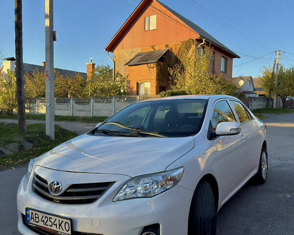 Белый Тойота Королла, объемом двигателя 1.33 л и пробегом 220 тыс. км за 6500 $, фото 2 на Automoto.ua