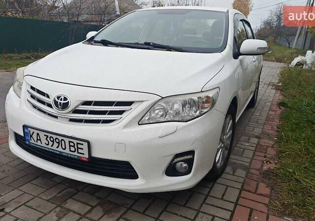 Білий Тойота Королла, об'ємом двигуна 1.6 л та пробігом 143 тис. км за 10300 $, фото 1 на Automoto.ua