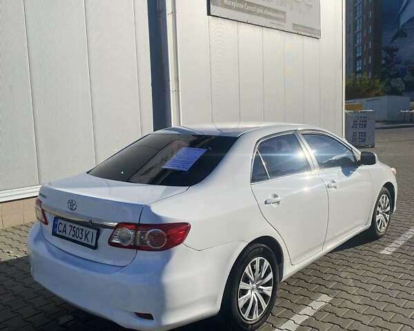 Белый Тойота Королла, объемом двигателя 1.8 л и пробегом 220 тыс. км за 7999 $, фото 3 на Automoto.ua