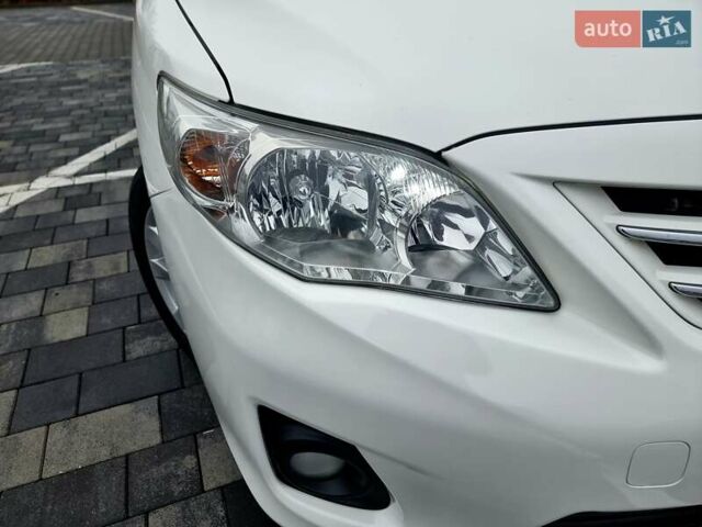 Білий Тойота Королла, об'ємом двигуна 1.6 л та пробігом 97 тис. км за 11300 $, фото 6 на Automoto.ua