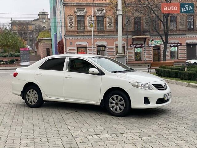 Белый Тойота Королла, объемом двигателя 1.33 л и пробегом 300 тыс. км за 5250 $, фото 3 на Automoto.ua