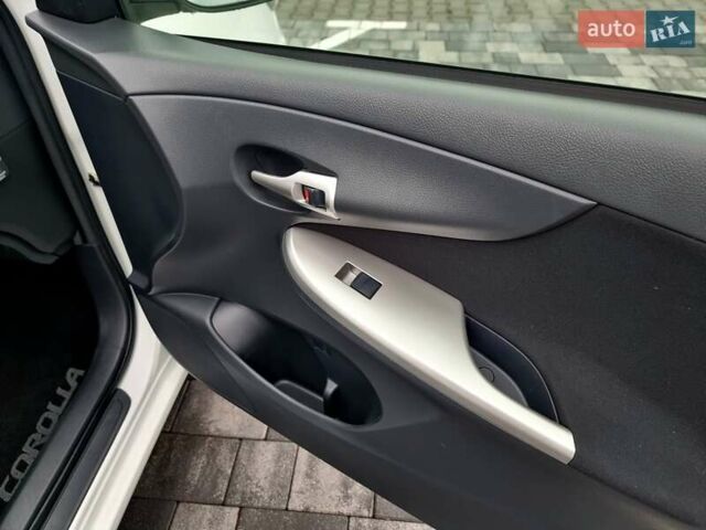 Білий Тойота Королла, об'ємом двигуна 1.6 л та пробігом 97 тис. км за 11300 $, фото 36 на Automoto.ua