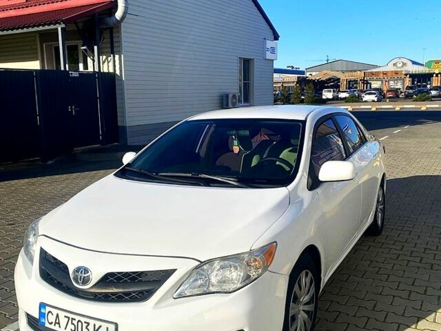 Білий Тойота Королла, об'ємом двигуна 1.8 л та пробігом 219 тис. км за 7999 $, фото 6 на Automoto.ua