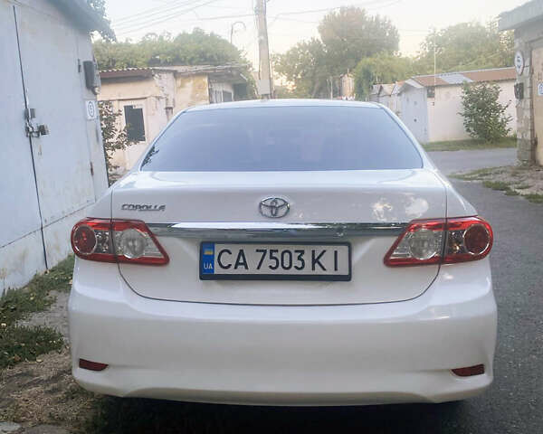 Белый Тойота Королла, объемом двигателя 1.8 л и пробегом 219 тыс. км за 7999 $, фото 6 на Automoto.ua