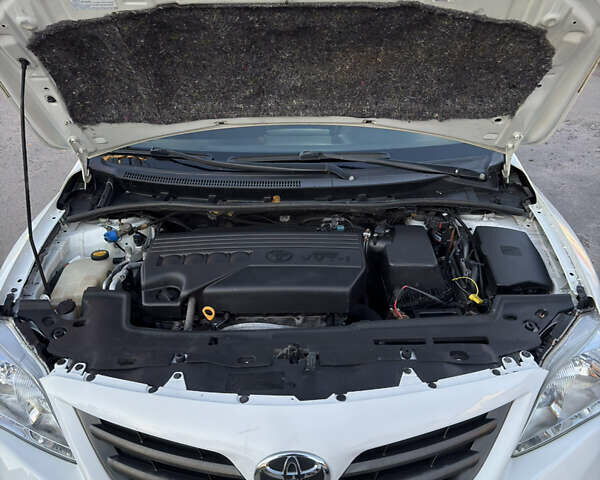 Белый Тойота Королла, объемом двигателя 1.33 л и пробегом 220 тыс. км за 6500 $, фото 18 на Automoto.ua