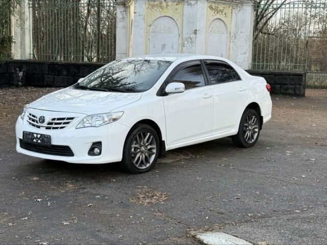 Белый Тойота Королла, объемом двигателя 1.6 л и пробегом 93 тыс. км за 10500 $, фото 1 на Automoto.ua