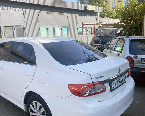 Белый Тойота Королла, объемом двигателя 1.8 л и пробегом 219 тыс. км за 7999 $, фото 4 на Automoto.ua