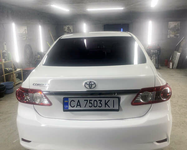 Белый Тойота Королла, объемом двигателя 1.8 л и пробегом 219 тыс. км за 7999 $, фото 7 на Automoto.ua