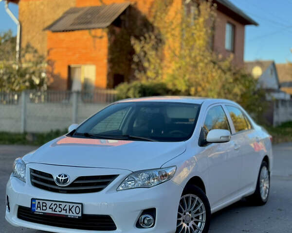 Белый Тойота Королла, объемом двигателя 1.33 л и пробегом 220 тыс. км за 6500 $, фото 7 на Automoto.ua