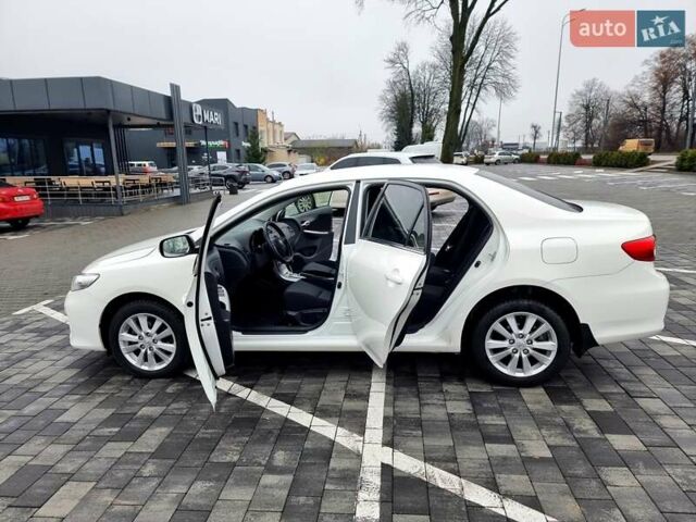 Білий Тойота Королла, об'ємом двигуна 1.6 л та пробігом 97 тис. км за 11300 $, фото 17 на Automoto.ua