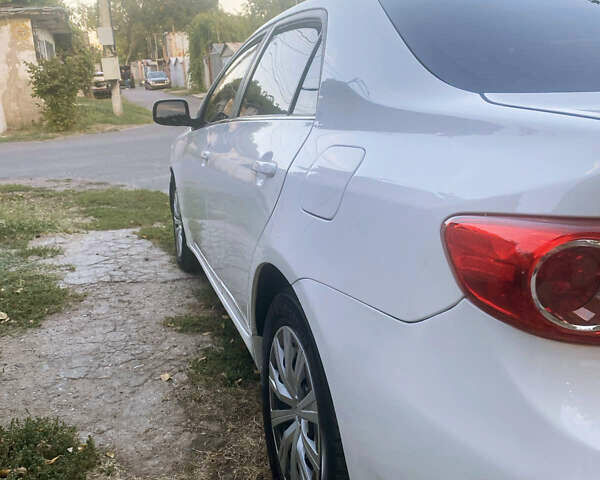 Белый Тойота Королла, объемом двигателя 1.8 л и пробегом 219 тыс. км за 7999 $, фото 3 на Automoto.ua