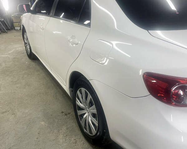 Белый Тойота Королла, объемом двигателя 1.8 л и пробегом 219 тыс. км за 7999 $, фото 8 на Automoto.ua