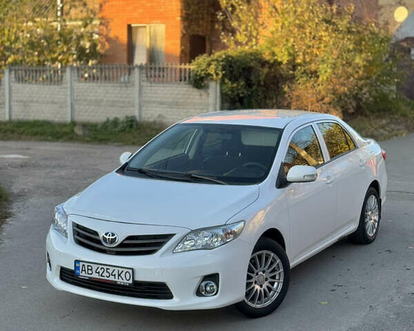 Белый Тойота Королла, объемом двигателя 1.33 л и пробегом 220 тыс. км за 6500 $, фото 11 на Automoto.ua