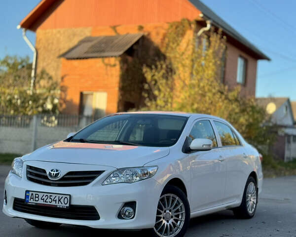 Белый Тойота Королла, объемом двигателя 1.33 л и пробегом 220 тыс. км за 6500 $, фото 5 на Automoto.ua