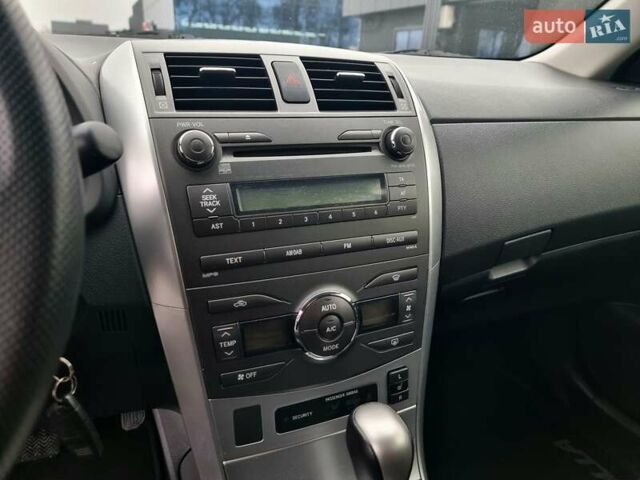 Білий Тойота Королла, об'ємом двигуна 1.6 л та пробігом 97 тис. км за 11300 $, фото 26 на Automoto.ua