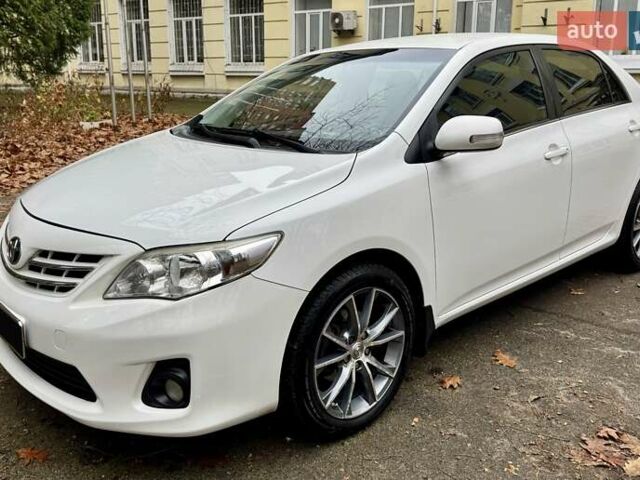 Белый Тойота Королла, объемом двигателя 1.6 л и пробегом 163 тыс. км за 9500 $, фото 1 на Automoto.ua