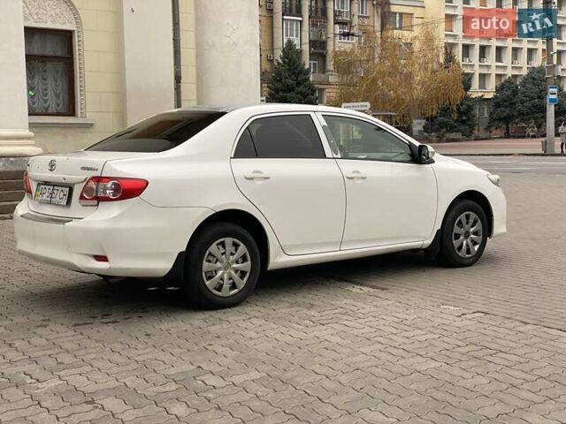 Белый Тойота Королла, объемом двигателя 1.33 л и пробегом 300 тыс. км за 5250 $, фото 4 на Automoto.ua
