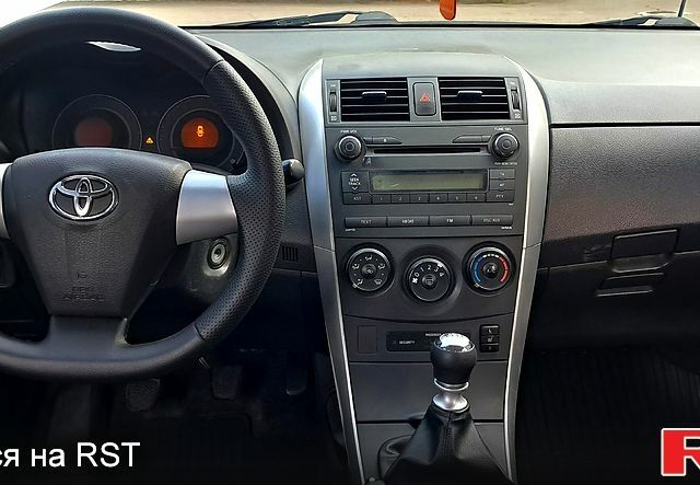 Белый Тойота Королла, объемом двигателя 1.6 л и пробегом 83 тыс. км за 9300 $, фото 6 на Automoto.ua