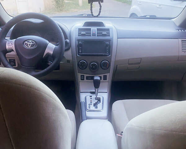 Белый Тойота Королла, объемом двигателя 1.8 л и пробегом 220 тыс. км за 7999 $, фото 9 на Automoto.ua