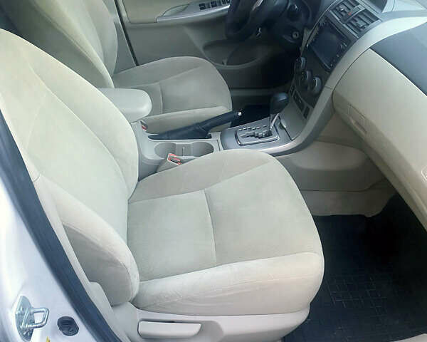 Белый Тойота Королла, объемом двигателя 1.8 л и пробегом 220 тыс. км за 7999 $, фото 8 на Automoto.ua