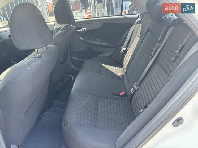 Білий Тойота Королла, об'ємом двигуна 1.33 л та пробігом 210 тис. км за 7000 $, фото 10 на Automoto.ua