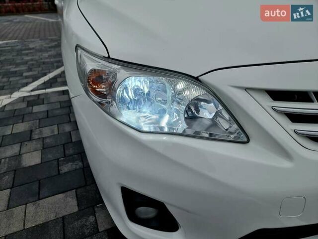 Білий Тойота Королла, об'ємом двигуна 1.6 л та пробігом 97 тис. км за 11300 $, фото 12 на Automoto.ua